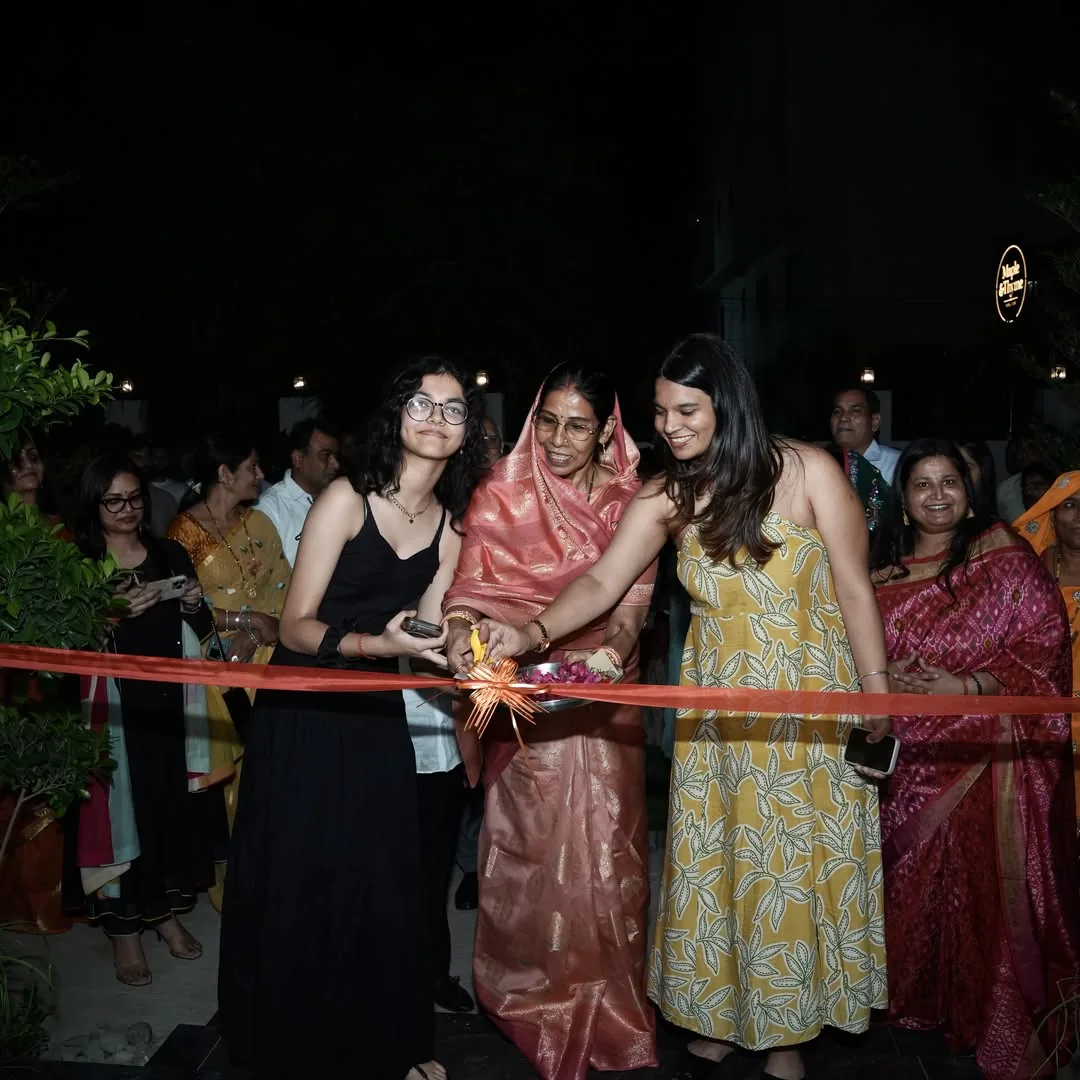 The family cutting the ribbon on opening night