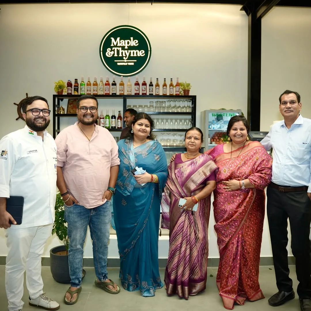 The Maple and Thyme team and family at the counter on launch day